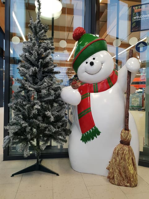 Snowman with broom