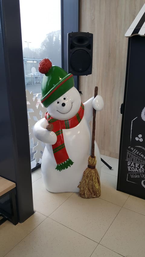 Snowman with broom